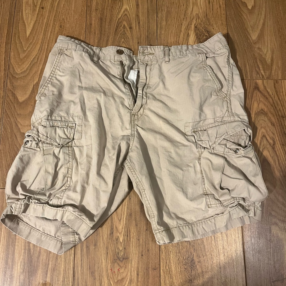 Levi shorts, worn, with slight bleech marks size around a medium?